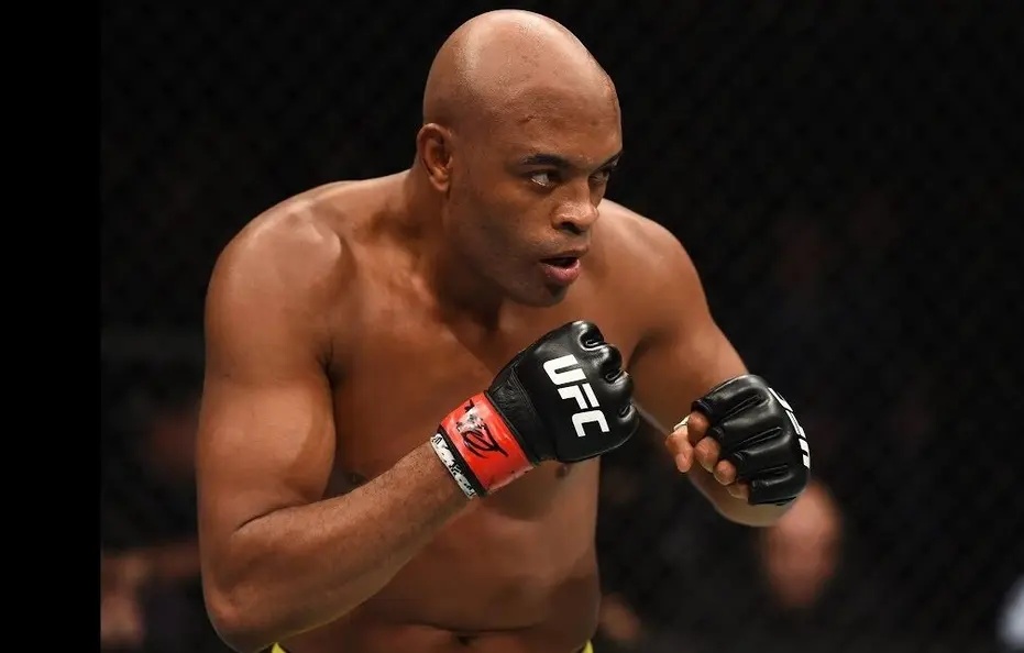 Anderson Silva derrota Tyron Woodley por nocaute técnico em luta de boxe